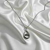 Silver Teardrop Radiance Necklace